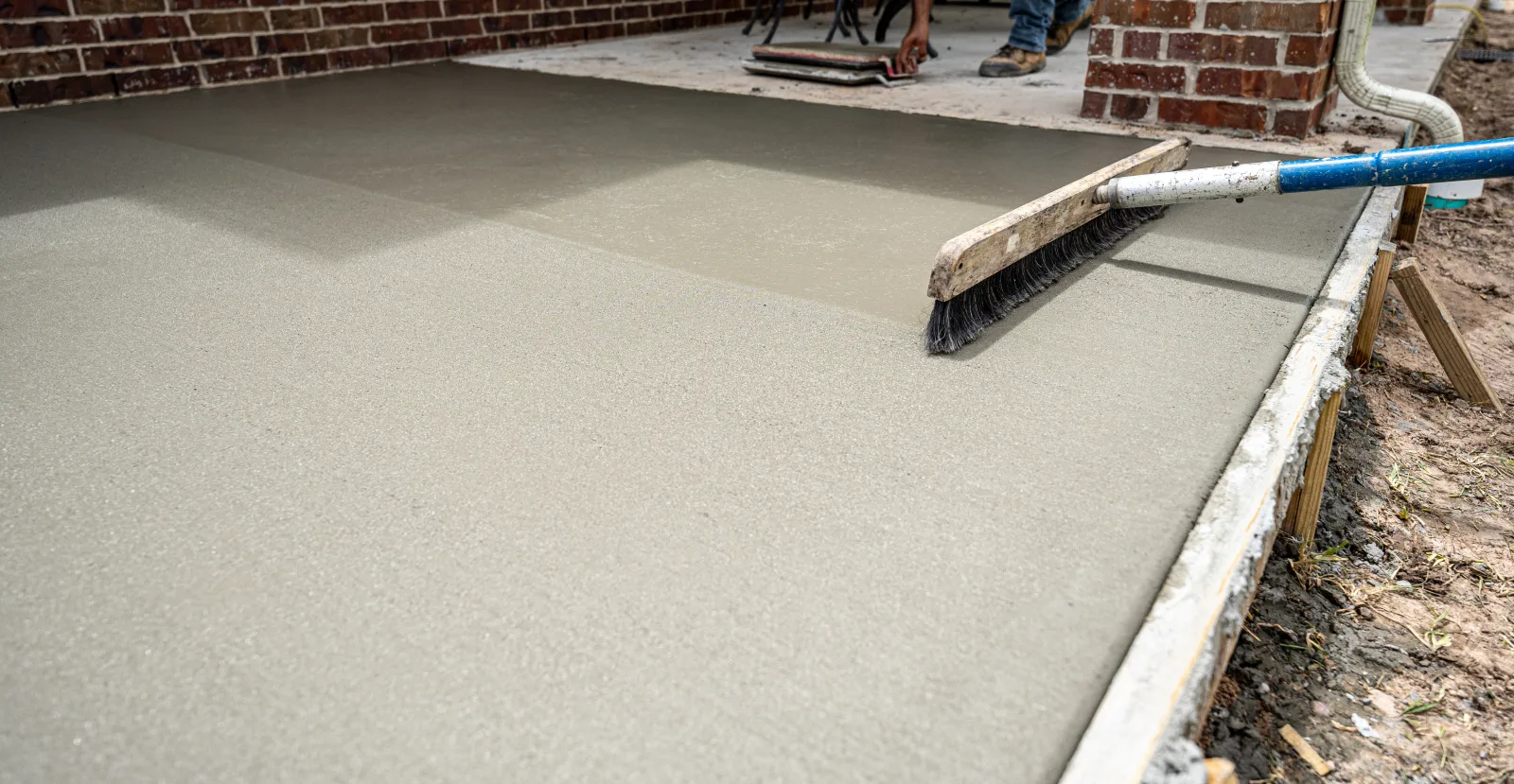 Broom-finished commercial concrete slab
