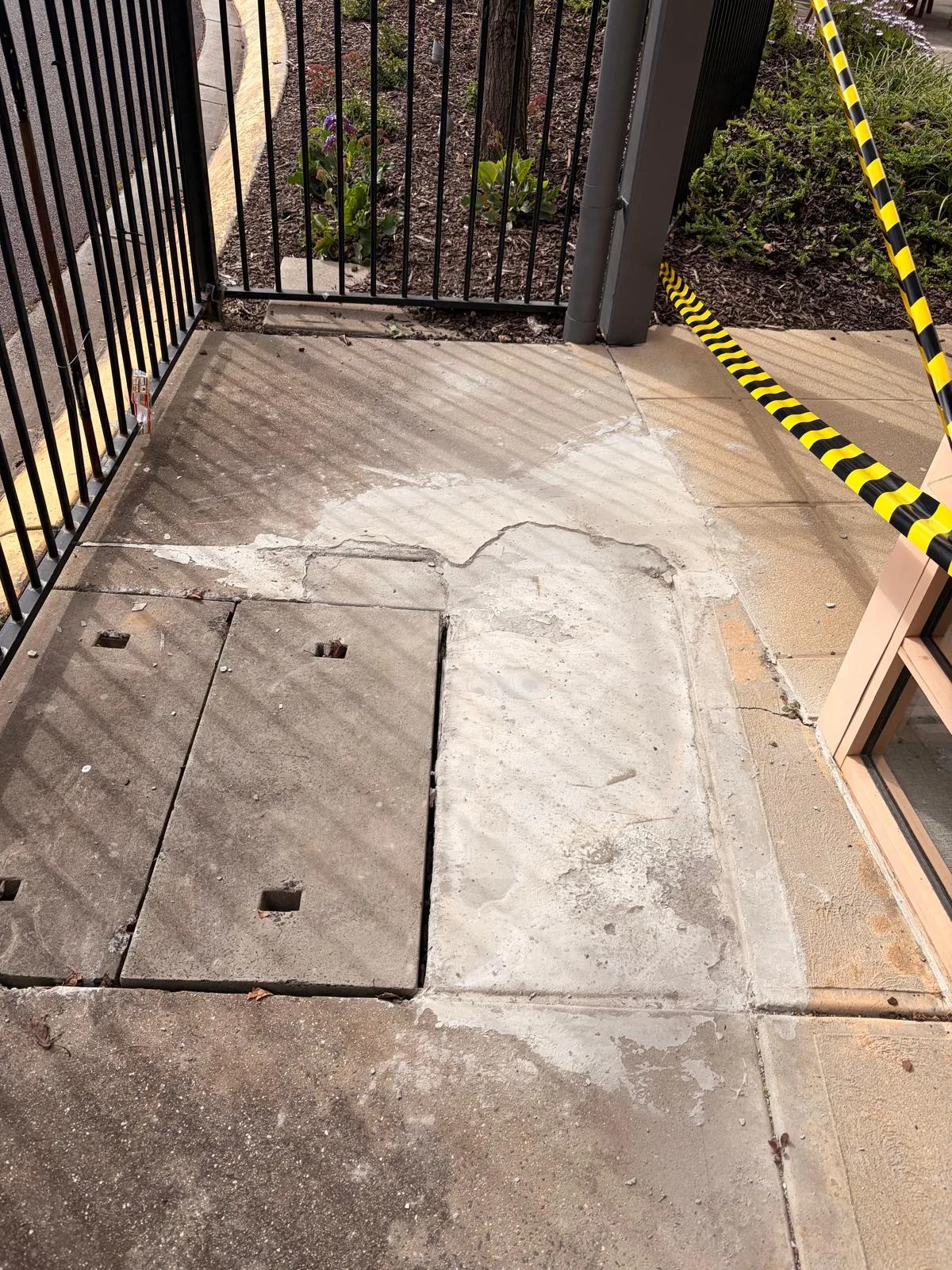 Cracked and patched path concrete, second view before breakout